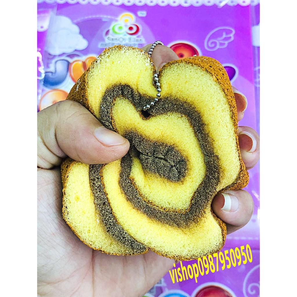Squishy bánh bông lan cuộn nhiều màu sắc