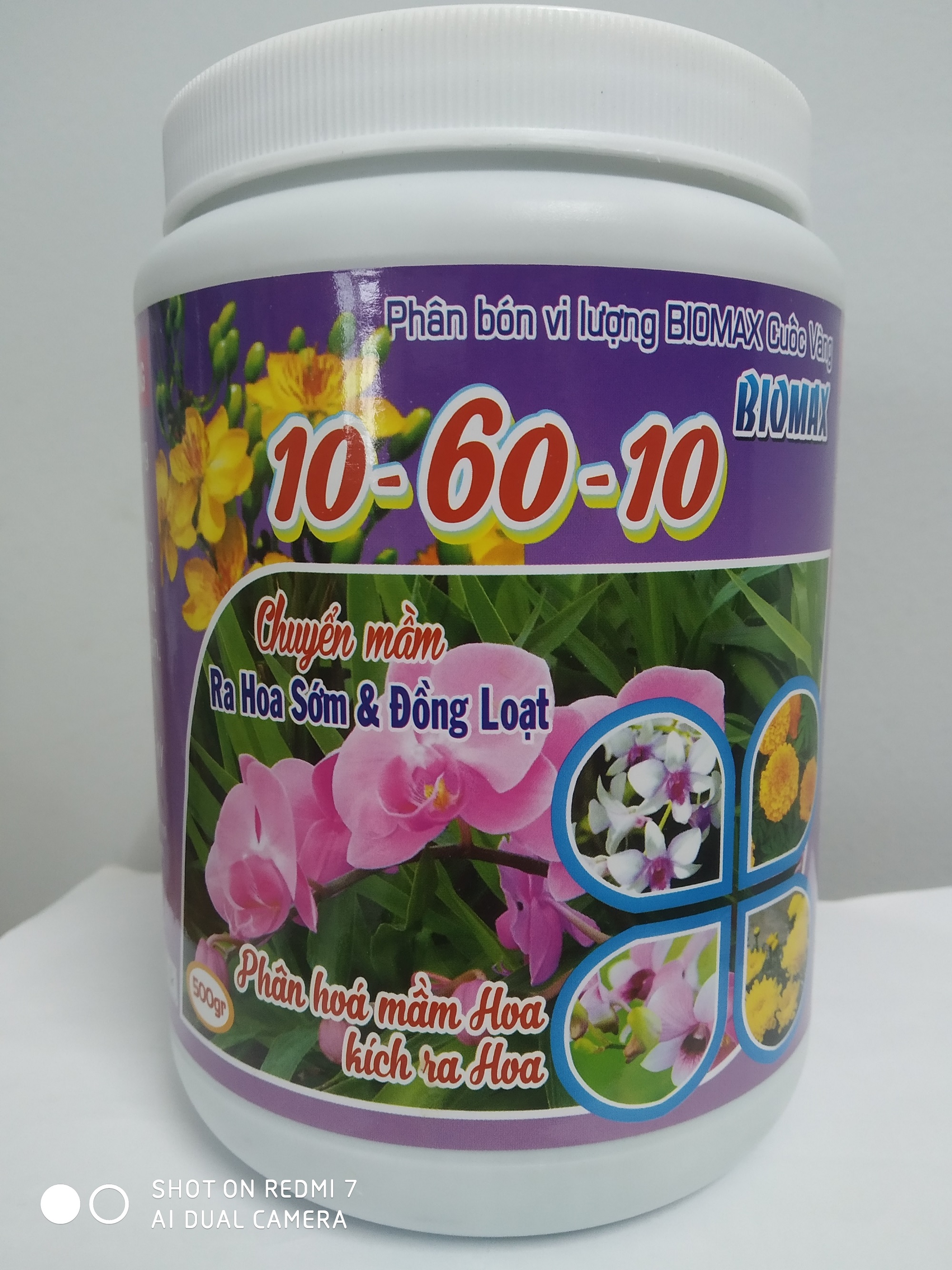 Phân bón vi lượng NPK 10-60-10 kích ra hoa sớm và đồng loạt - chai 500 gram Biomax