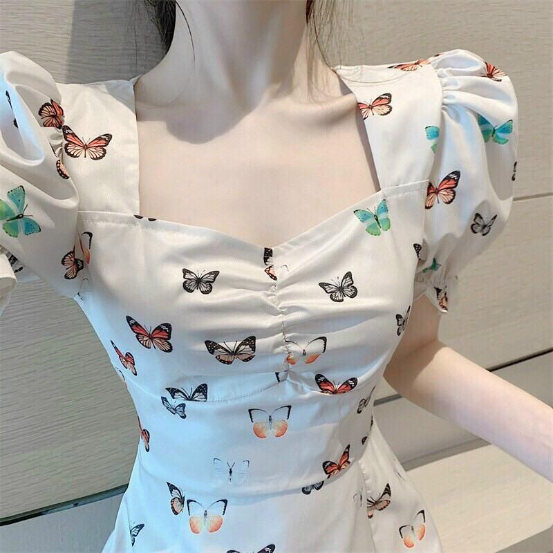 Đầm xoè hoạ tiết bướm xẻ tà tay phồng siêu xinh
