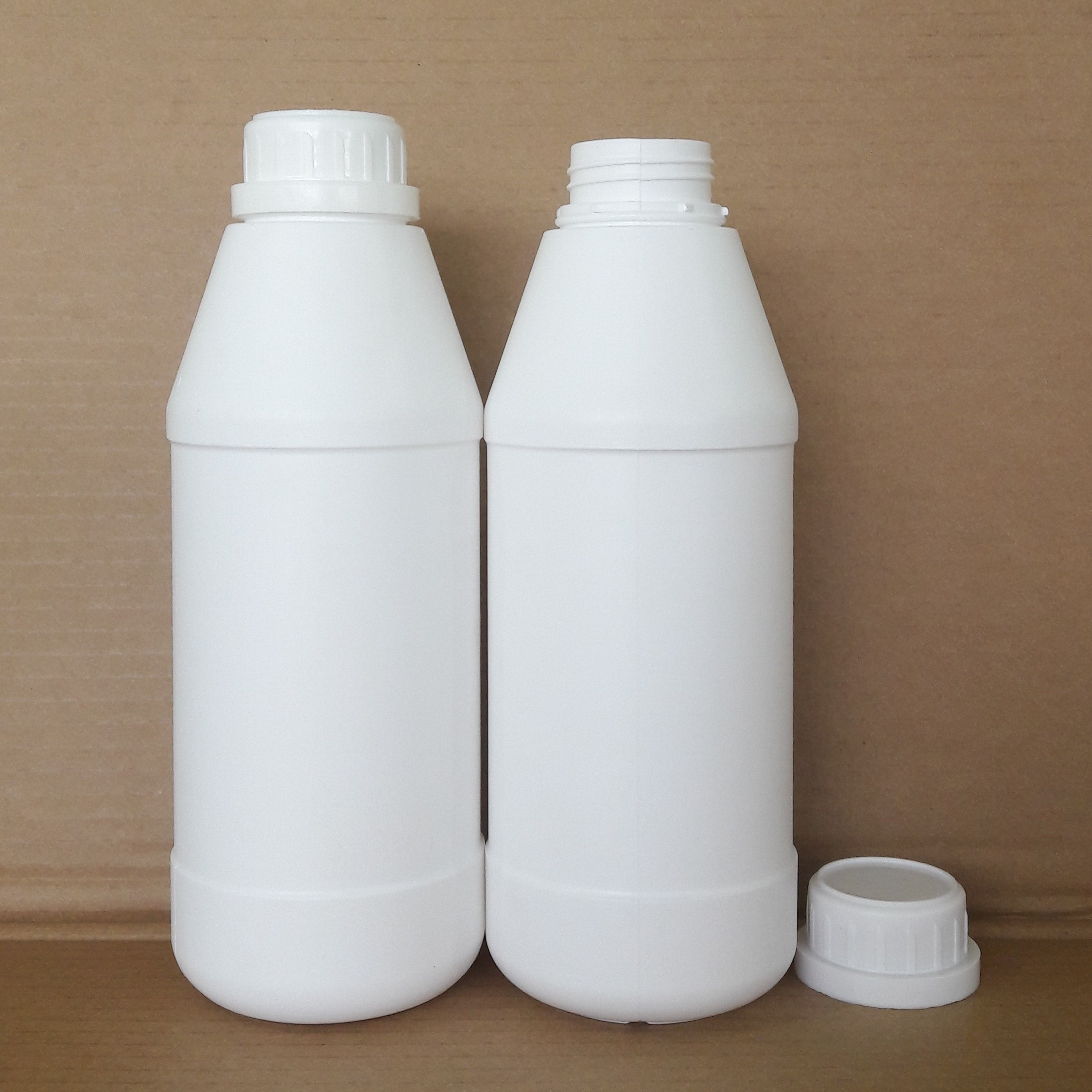 Chai Nhựa Trắng Đục 1000mL HPDE Mã B100-10 Nắp Vặn Thân Xéo Siêu Xinh