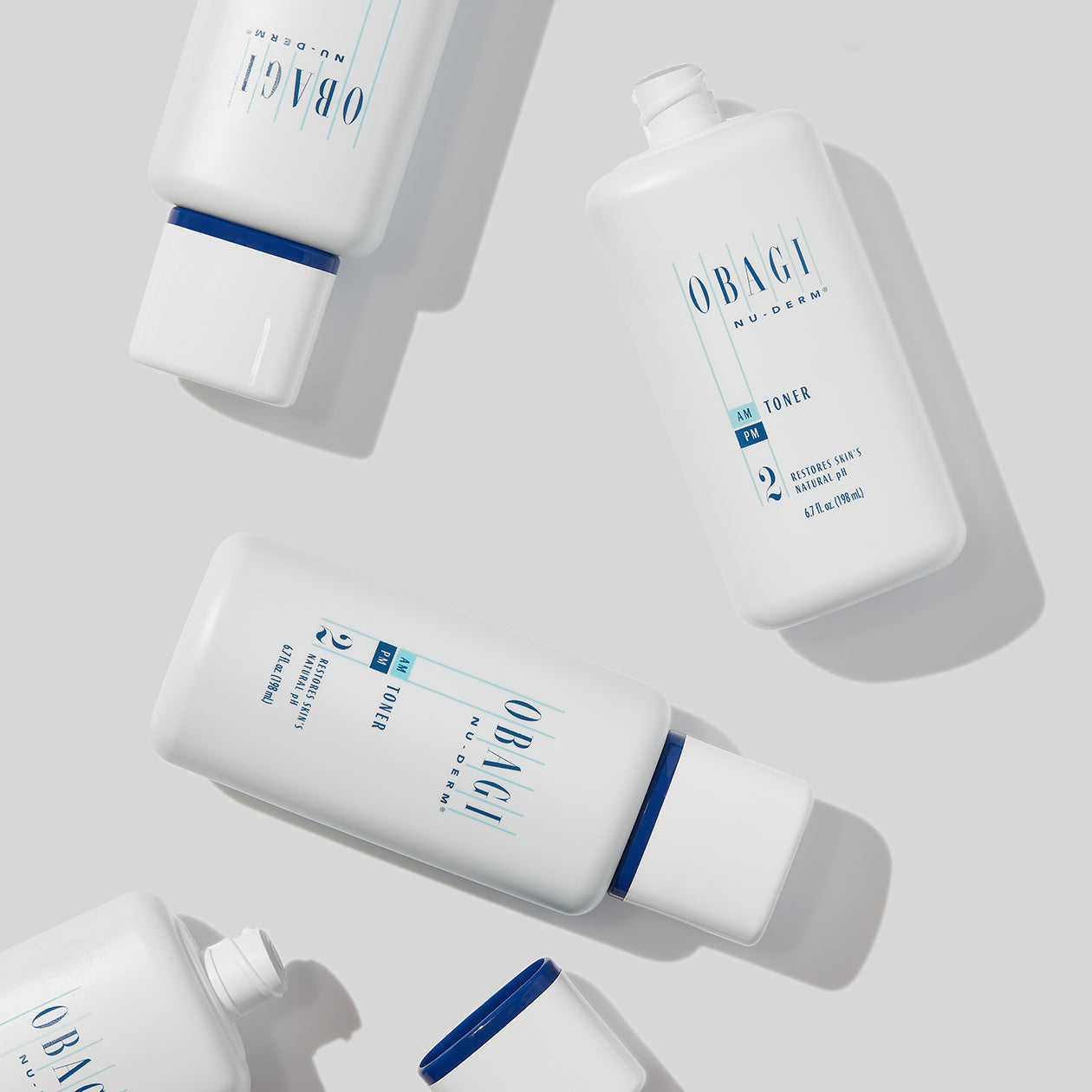 Nước Hoa Hồng Không Cồn Cân Bằng pH Chiết Xuất Cây Phỉ &amp; Lô Hội Obagi Nu-Derm 198ml