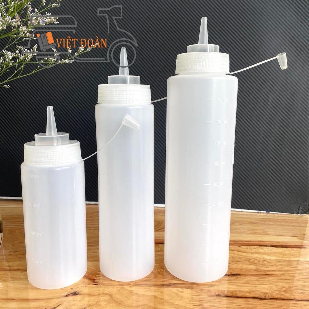 Bình chai đựng sốt - đựng tương- nước đường - sữa đặc . Nhựa dày , vạch ml in chìm rõ nét -400ml, 600ml, 900ml