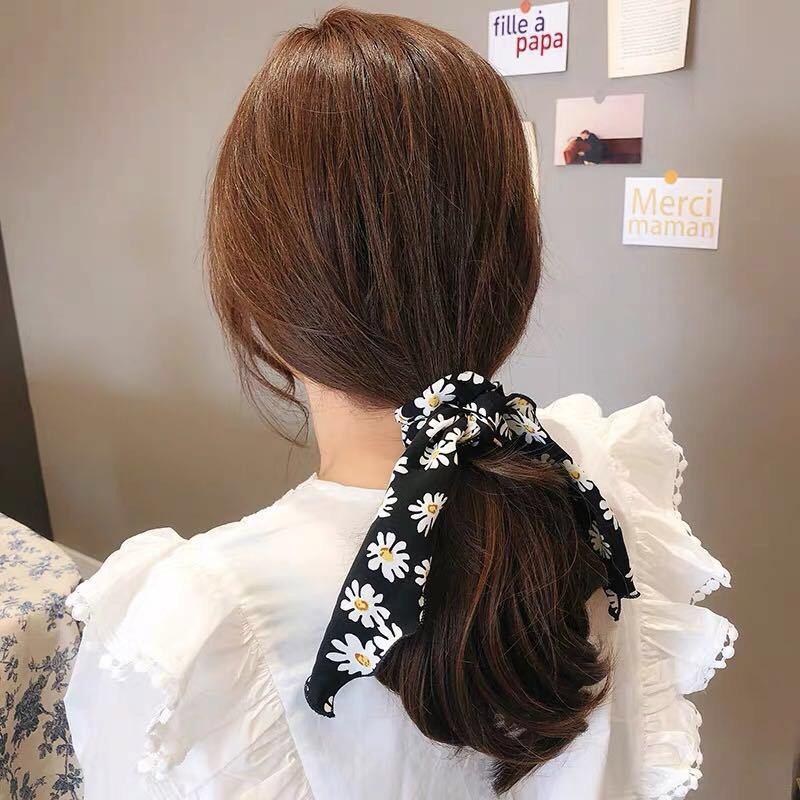 Cột tóc nơ hoa cúc dài tiểu thư sang trọng Tatitava