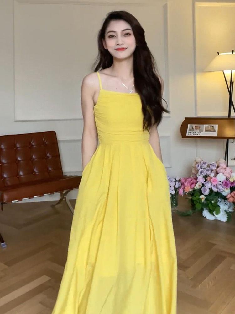 TOBE1SHOP Tea Break French Sling Dress 2023 Mùa hè bờ biển nghỉ mát thắt lưng có vẻ gầy màu vàng một chữ đầm dài