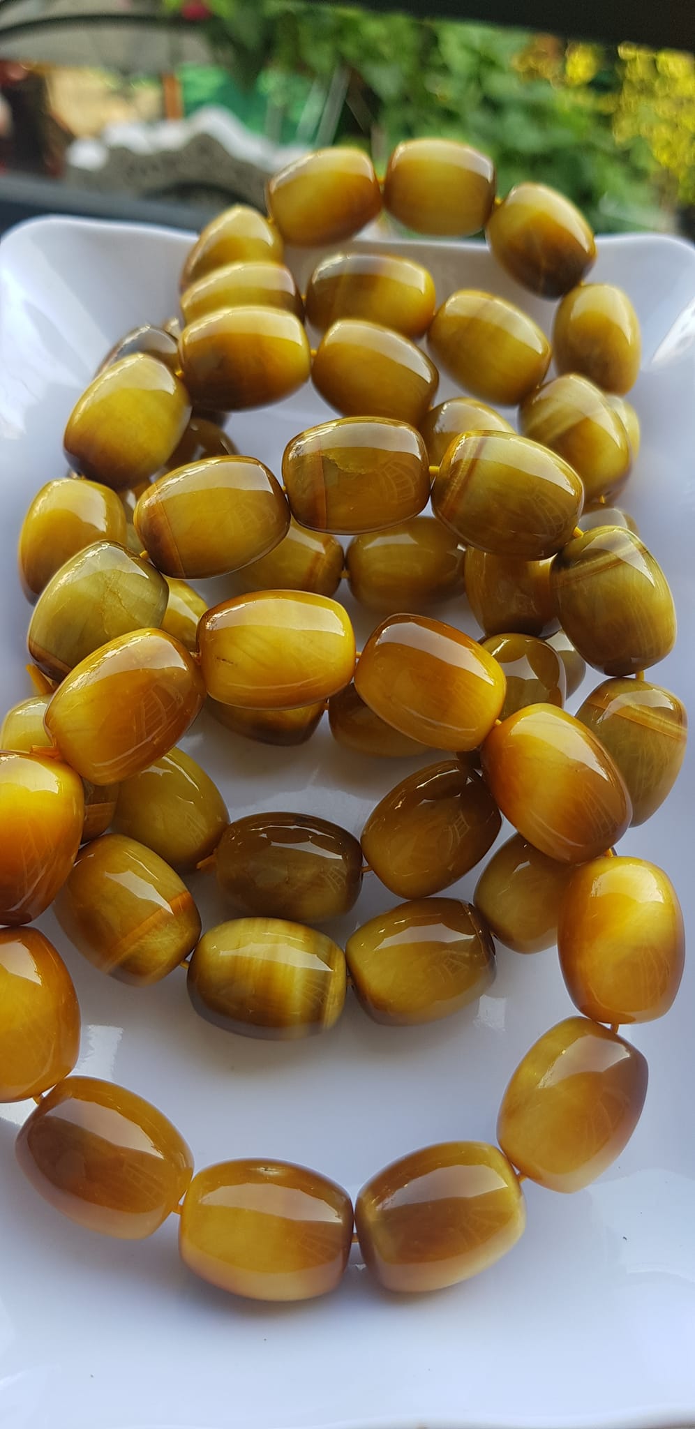 Vòng Tay Phong Thủy Nam Mệnh Thổ Kim Thủy Mới Đẹp Hạt Lu Thống Mới Vàng Nâu bóng đẹp Chất liệu đá mắt hổ tự nhiên vàng nâu bóng đẹp ạ Size hạt 14mm x dài 19mm ạ