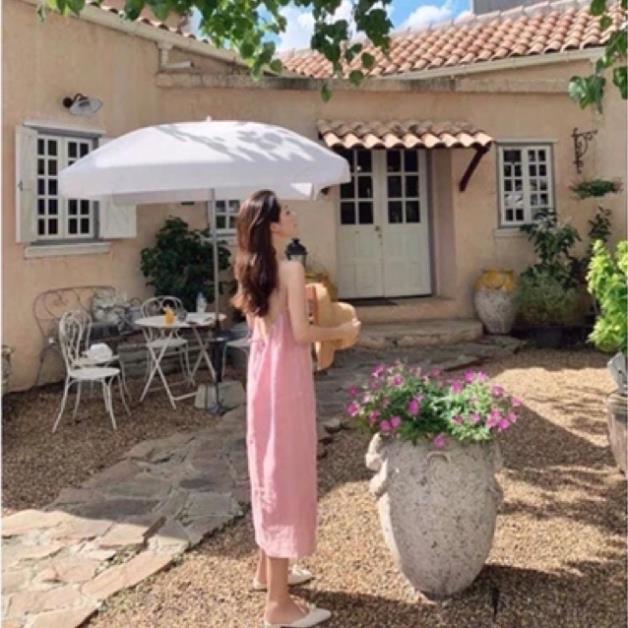 Váy 2 dây trơn đi biển hở lưng thắt nơ chất đũi nhiều màu