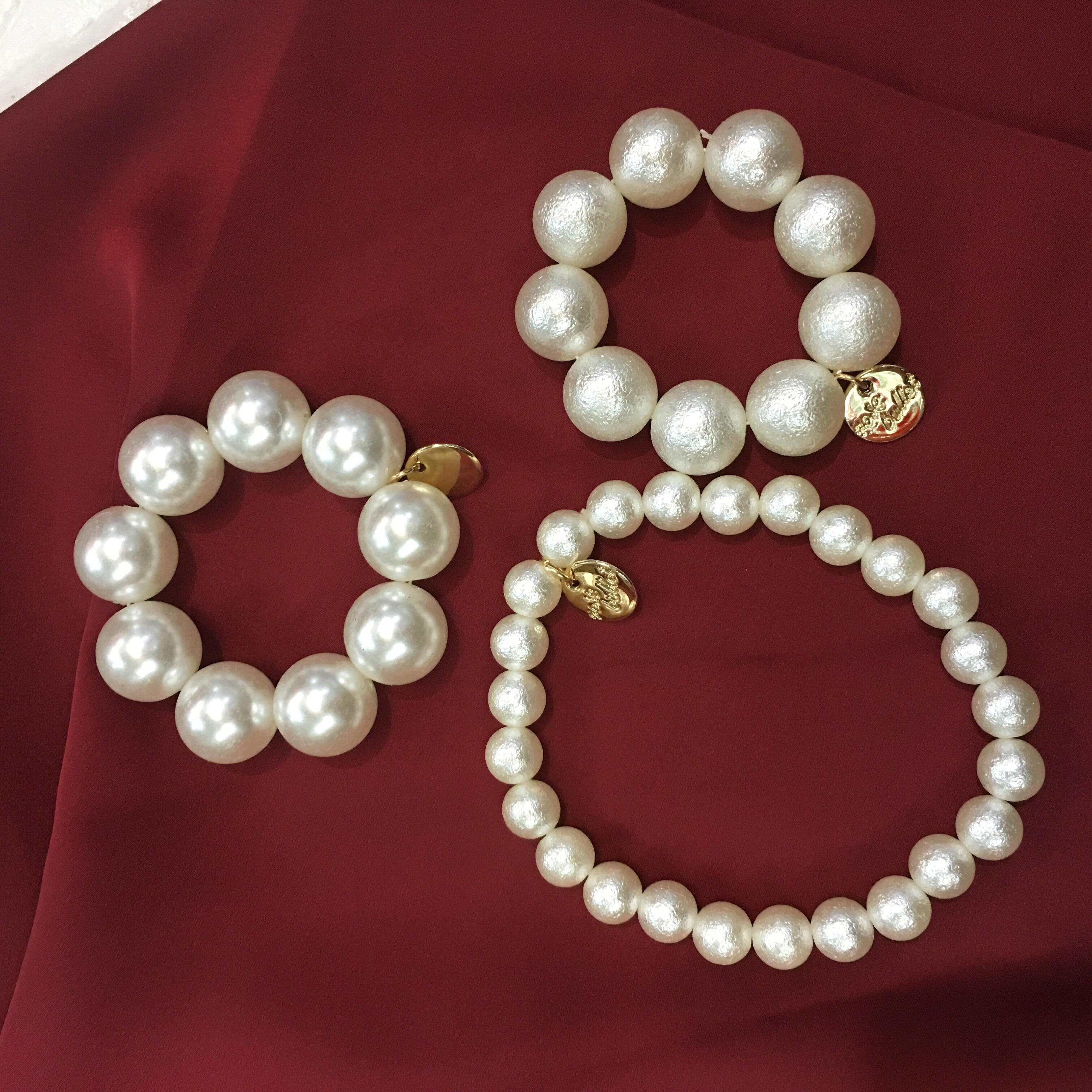 Set 3 chiếc cột búi tóc hạt trai:3 chiếc 3 kiểu khác nhau,thun co giãn,hạt màu ngà ngà ánh trai sang chảnh