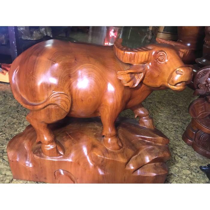 Tượng Gỗ Mỹ Nghệ Chạm Con Trâu đứng đep kích thuóc dài 50cm cao 40cm Anh Chị trưng phòng khách nhà , công ty ý nghĩa biểu tượng Con Trâu làm đầu cơ nghiệp giống như công sức mình làm lụng vất vả có ngày thành đạt ,may mắn &amp; thành công ạ