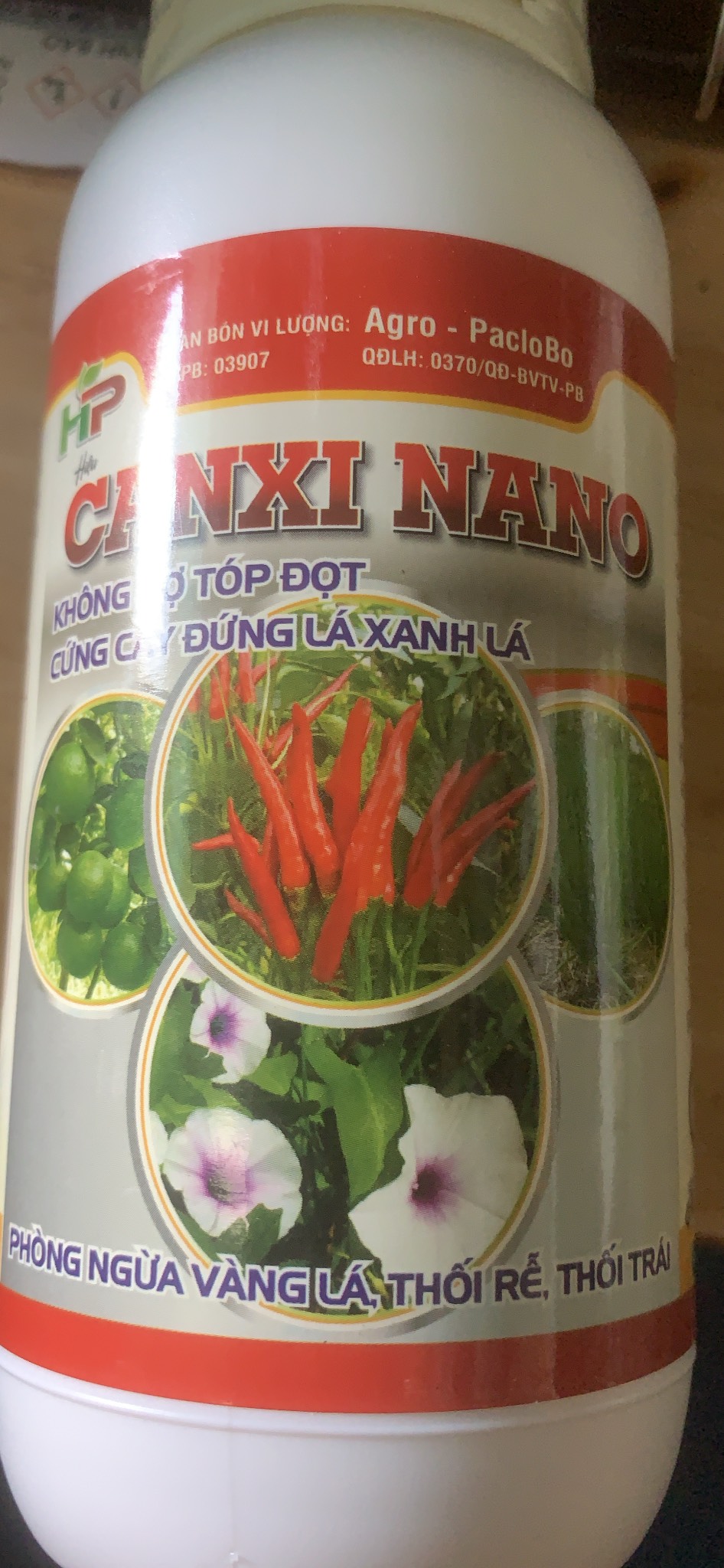 Sản phẩm CANXI NANO lọ 500ml không tóp đọt cứng cây đứng lá xanh lá
