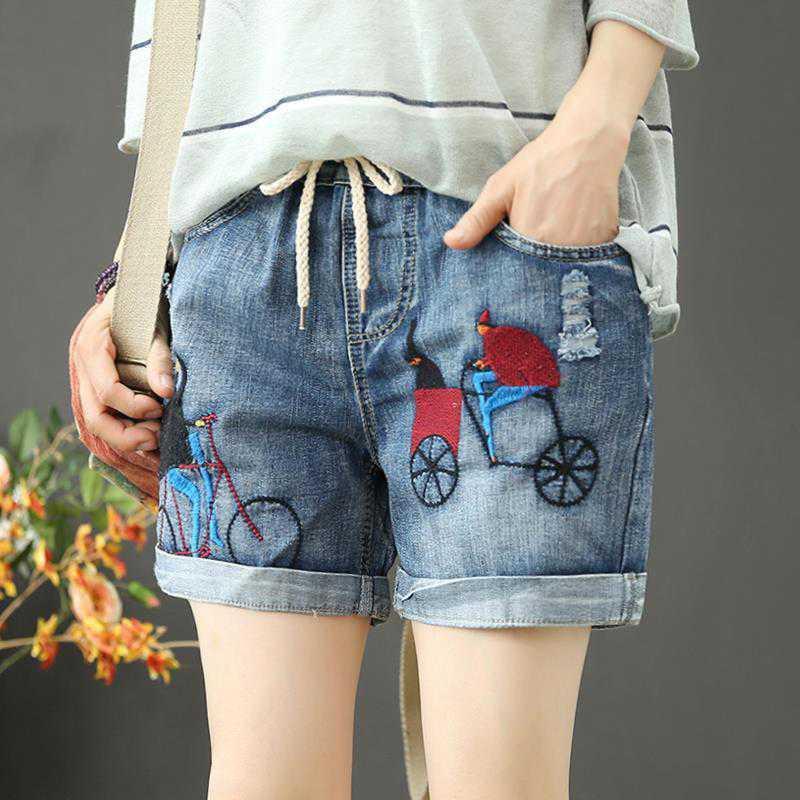 Quần Short Jean Lưng Cao Ống Rộng Thêu Họa Tiết Thiết Kế Rách Cá Tính Cho Nữ