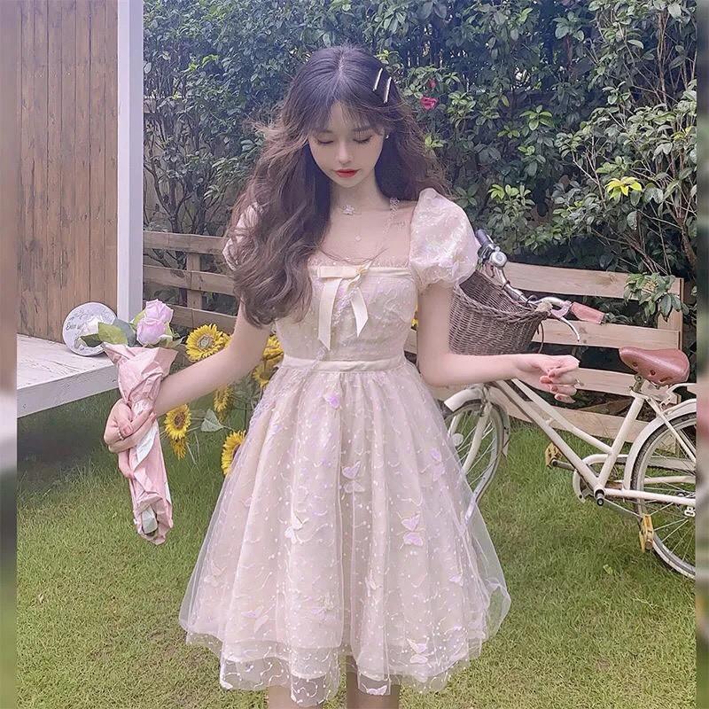 Váy trắng tay bồng lấp lánh