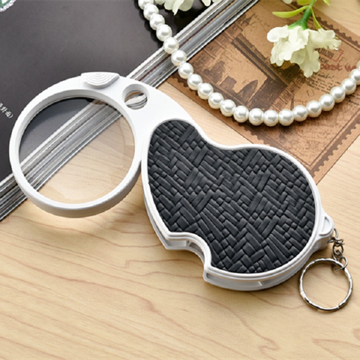 Kính lúp mini cầm tay 8x-20x soi tem, trang sức siêu nét có đèn trợ sáng cao cấp
