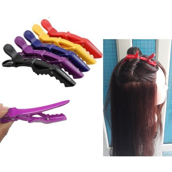 Kẹp vịt chia tóc hỗ trợ trong quá trình làm tóc