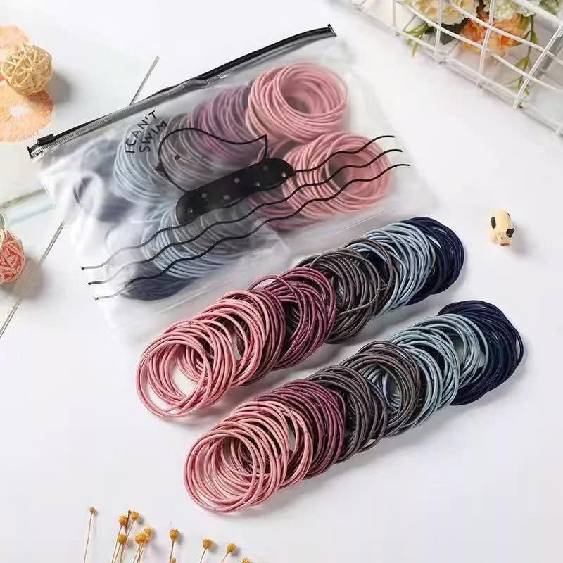 Set 100 dây chun buộc tóc trơn nhiều màu co giãn tốt đựng trong túi zip tiện lợi, có thể tái sử dụng Nhung Voi Nữ