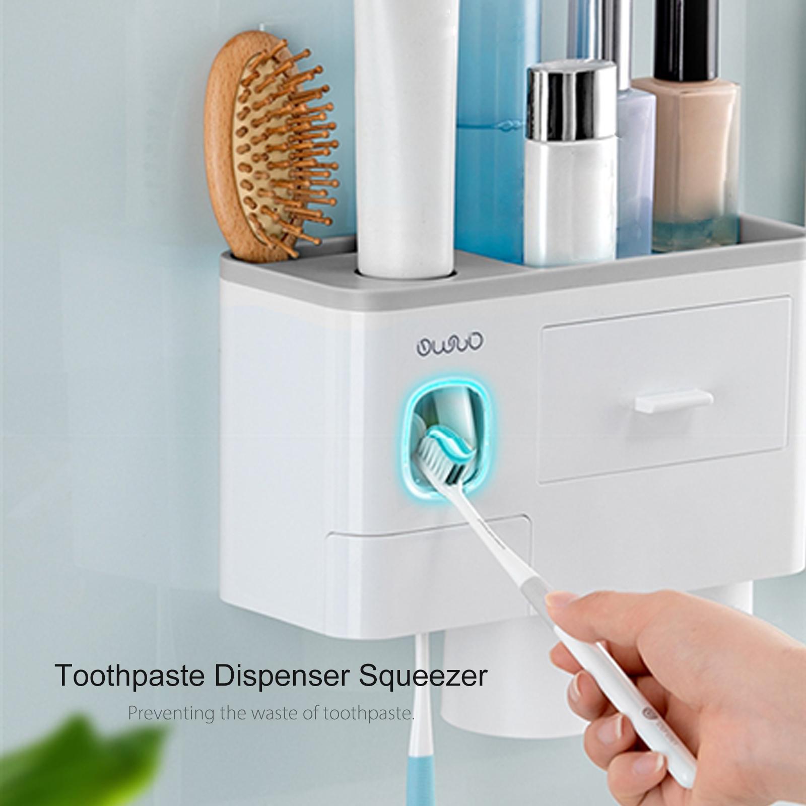 Dụng cụ phân phối kem đánh răng từ tính với thiết kế kèm giá để bàn chải đánh răng