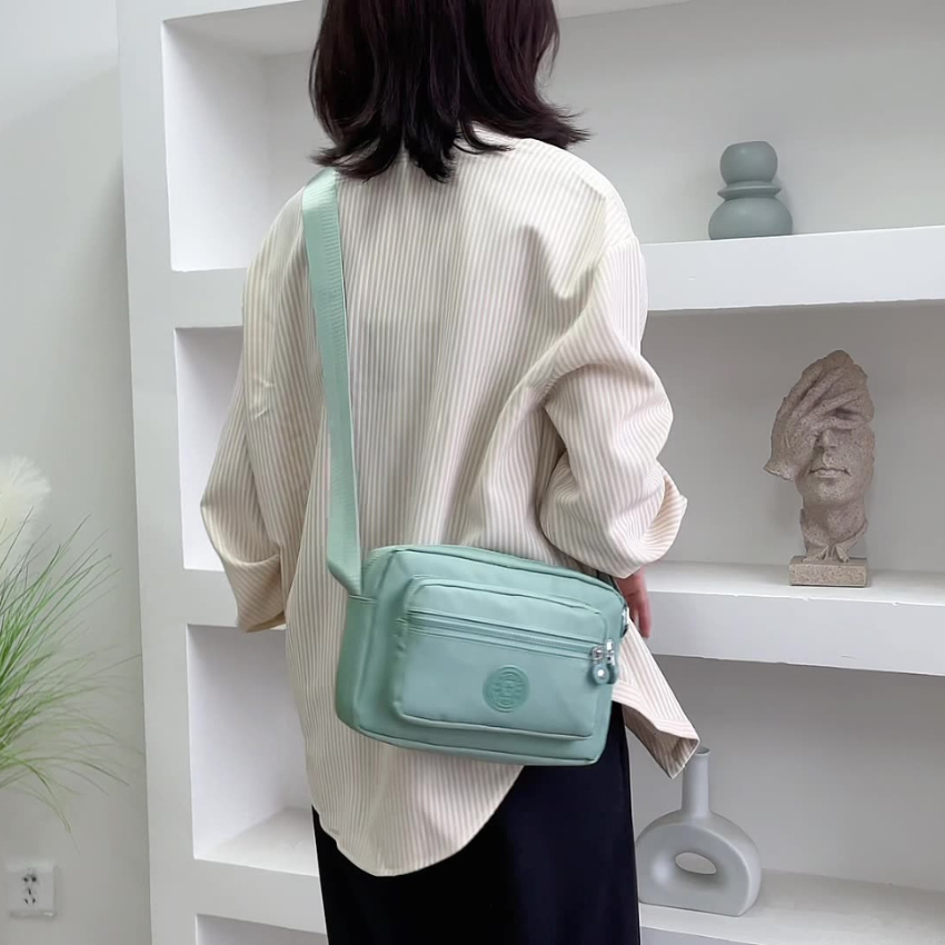 Túi giỏ xách đeo chéo đeo vai nữ size 24cm chất liệu vải dù chống nước chống xước cao cấp với nhiều ngăn tiện dụng TX073