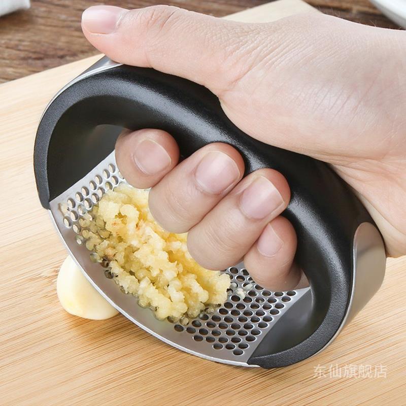 Dụng cụ ép hành tỏi cầm tay
