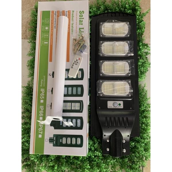 Đèn năng lượng mặt trời liền thể,tặng kèm bộ cán,ốc vít nở,điều khiển từ xa