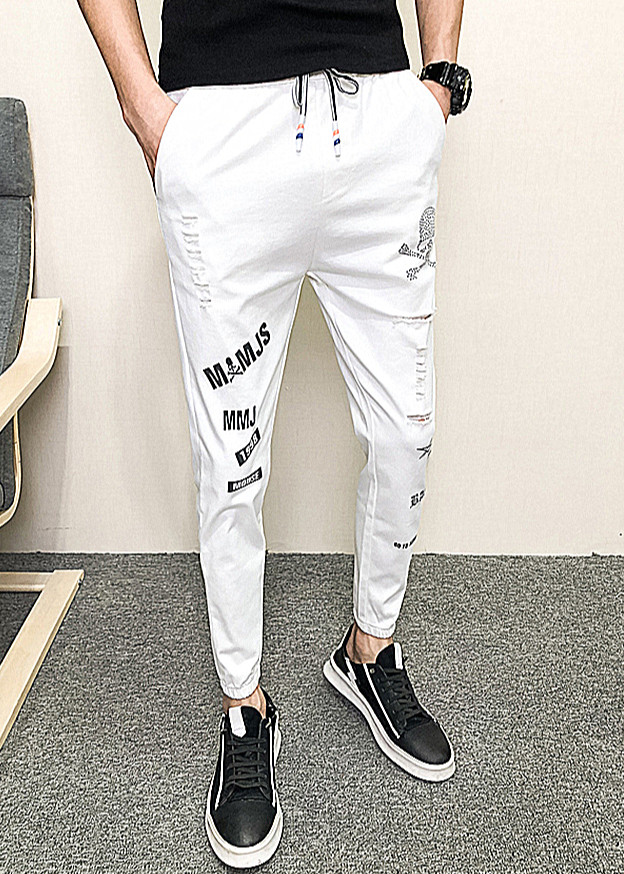 Quần Jogger Nam ống bo 9 tấc rách xước cùng họa tiết in độc đáo mang phong cách Hàn Quốc chất liệu vải Cotton cao cấp, co giãn nhẹ ôm vừa hợp xu hướng thời trang - Mẫu HOT