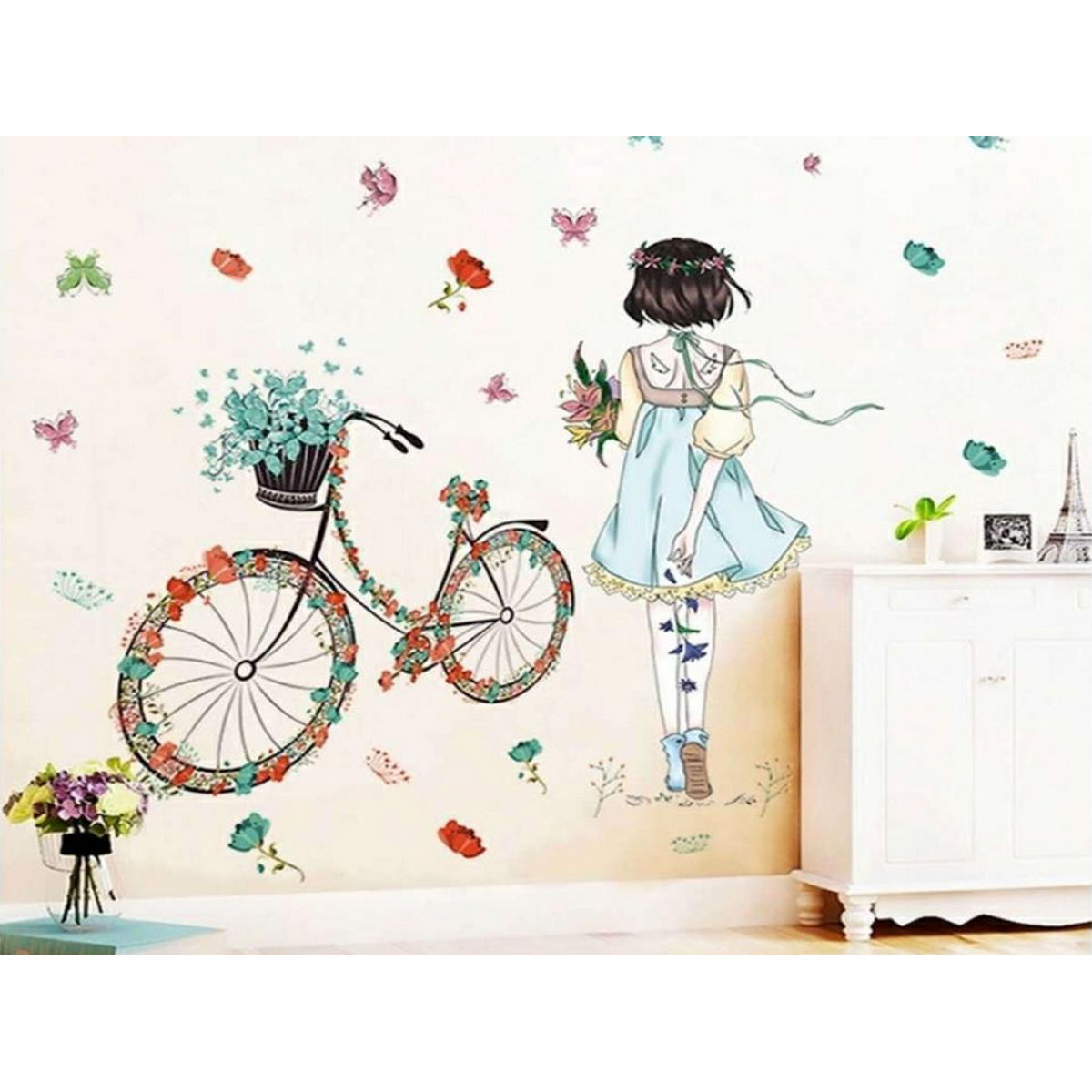 Decal dán tường cô gái quay lưng xe đạp