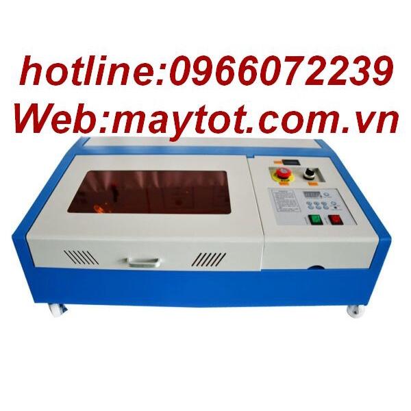 Máy cắt khắc laser model YH-3020 khắc tem trên vật liệu phi kim loại như tem sừng bò, gỗ, con dấu nhựa đỏ,pha lê,..