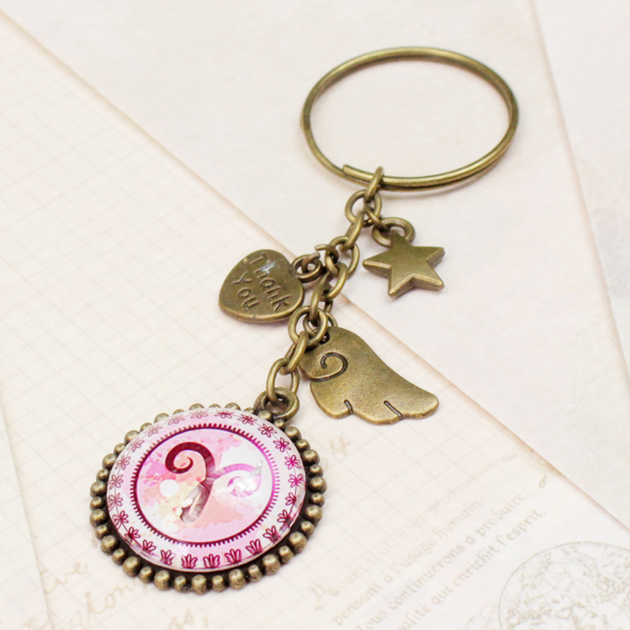 Móc khóa 12 cung hoàng đạo Zodiac màu sắc tươi sáng siêu đẹp 06646-MK0028