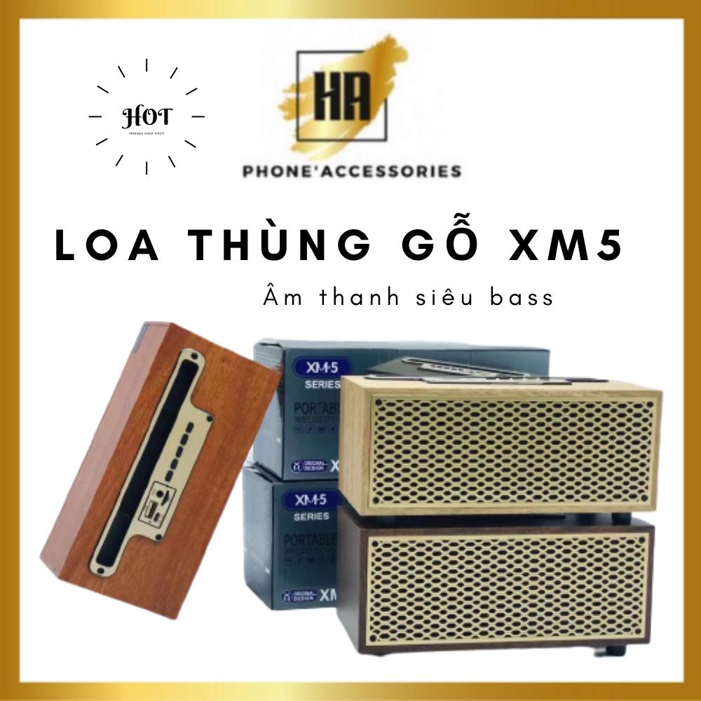 Loa bluetood XM5 thùng gỗ , thiết kế sang trọng , có giá để điện thoại , âm thanh cực hay ,