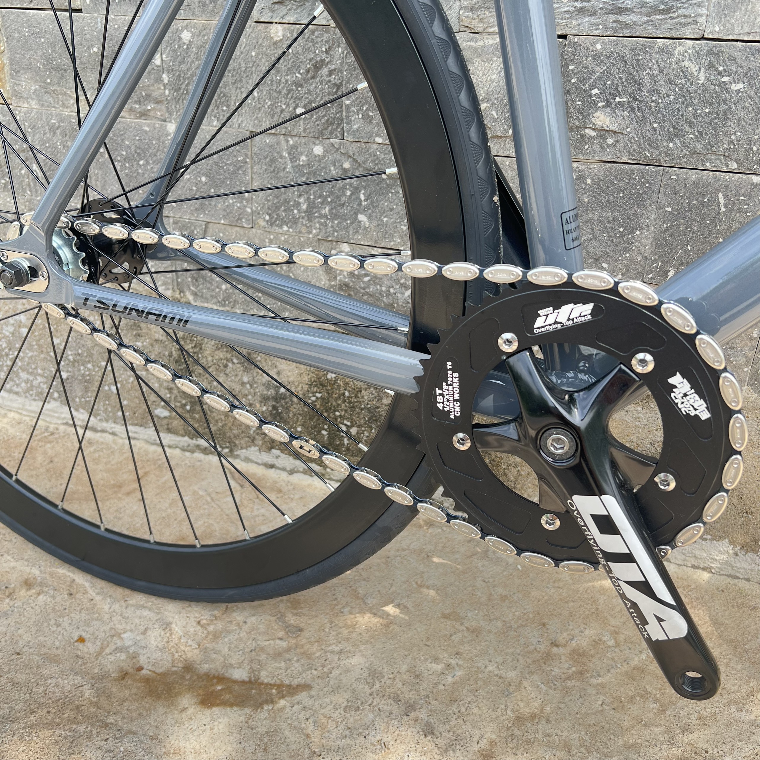 Xe đạp fixed gear TSUNAMI SNM100 nâng cao - Xám xi măng