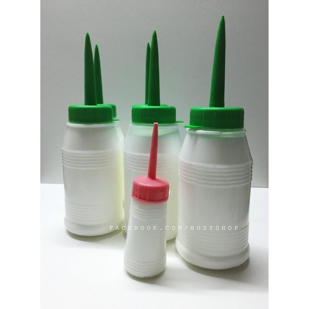 Keo sữa chai lớn dán thủ công
