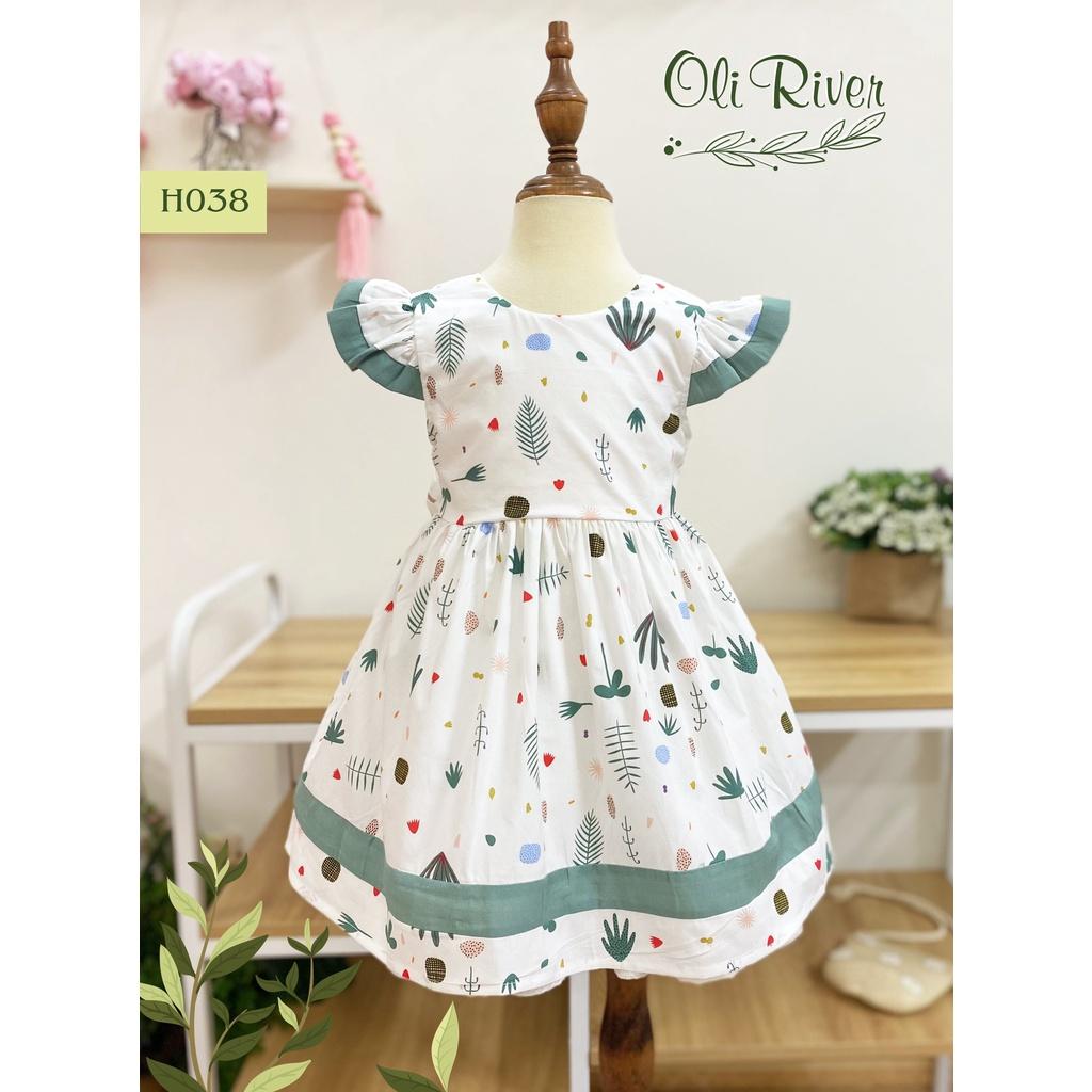 Đầm bé gái Oli River hở lưng hoạ tiết hoa cỏ tay cánh tiên cho bé từ 8 đến 32kg
