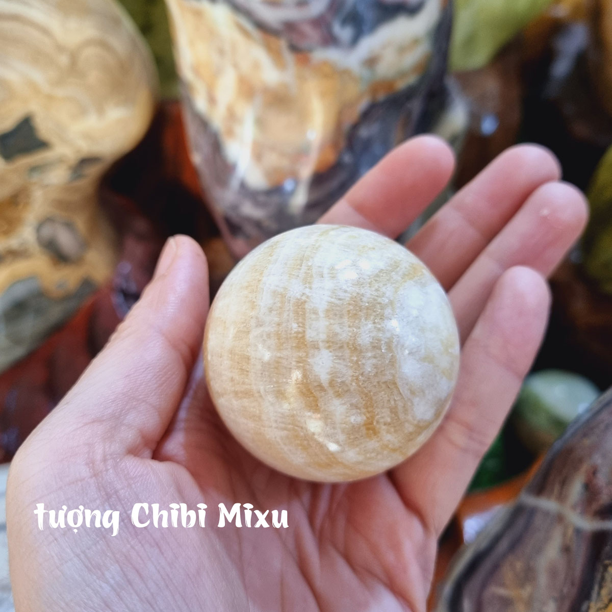 Bi cầu phong thủy canxit nâu đất nhạt 4.5-5cm cho người mệnh Kim và Thổ đá Việt Nam