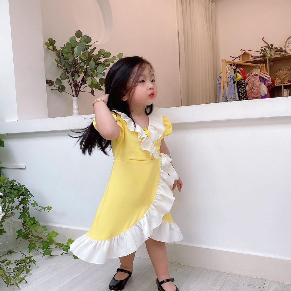Đầm vàng chéo NƠ
