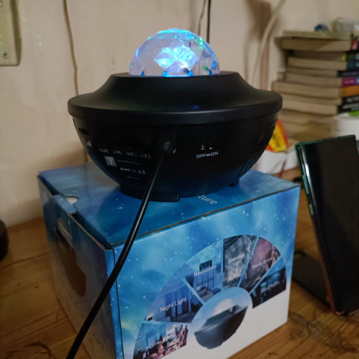 Chiếu sao thiên hà - Máy chiếu laser led nhiều màu có nhạc - T0246