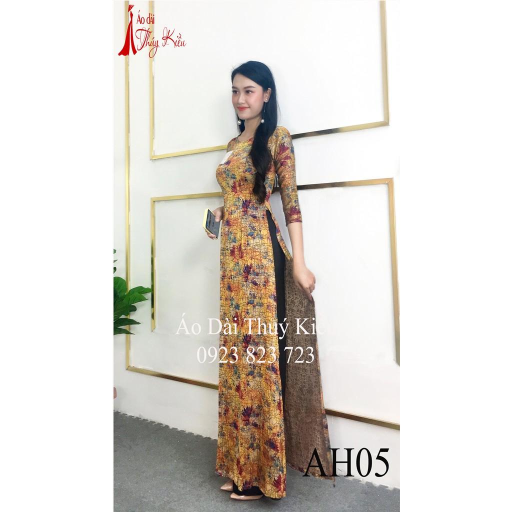 Áo dài Đông Hưng nền vàng đồng in hoa lá cành AH05
