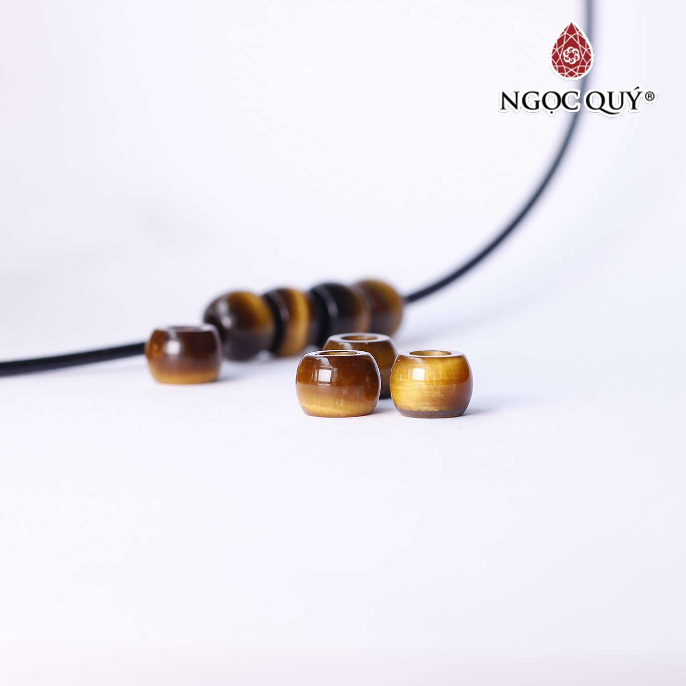 Charm đá hình lu thống đá mắt hổ vàng nâu 8x6mm mệnh thổ,kim - Ngọc Quý Gemstones