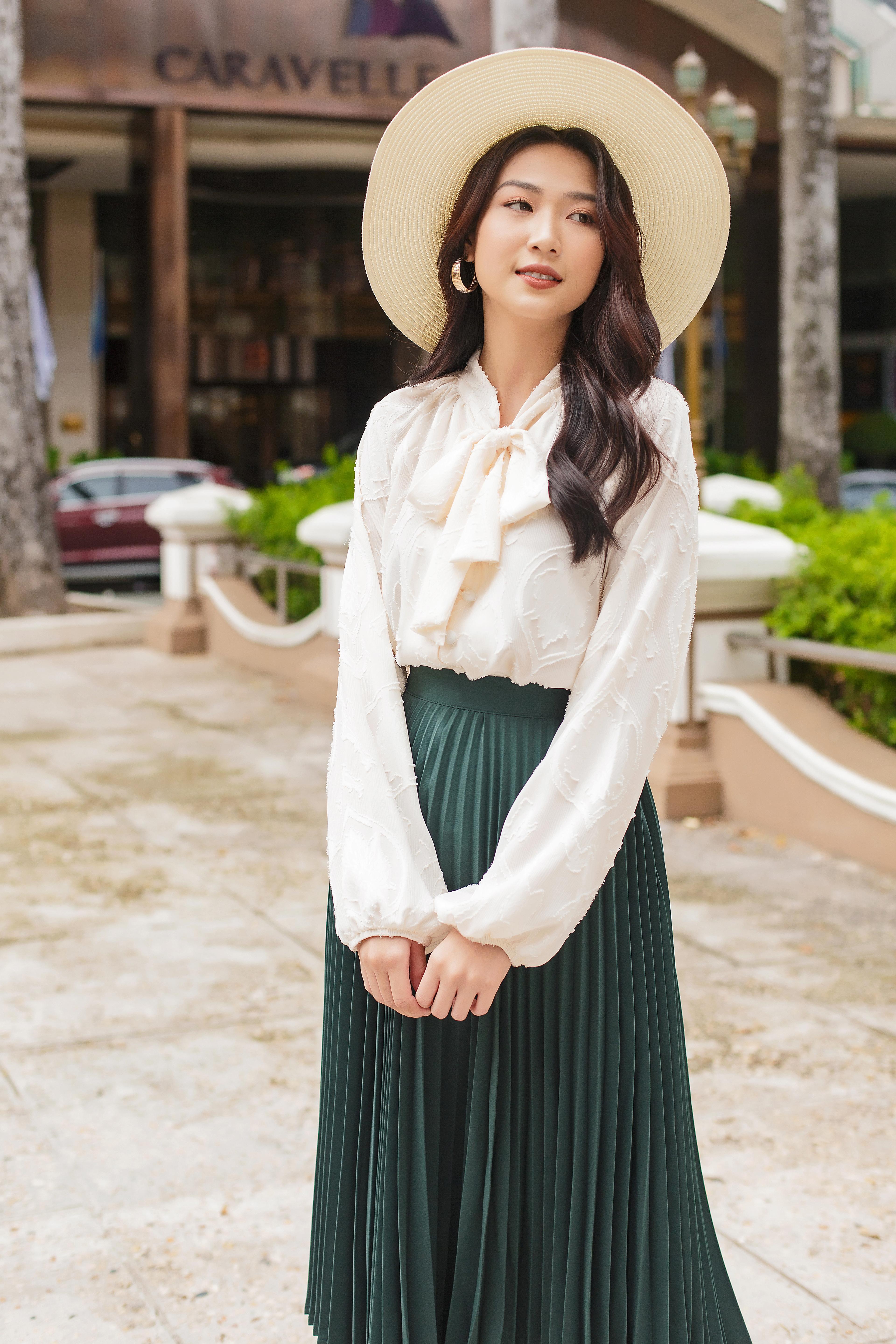 Áo tay phồng nơ cổ