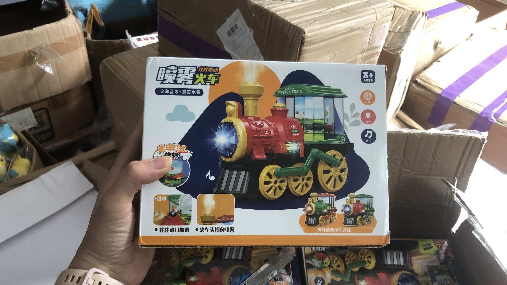 Đồ chơi xe lửa cổ điển phun được khói có nhạc và đèn tự chạy kèm đèn ảnh