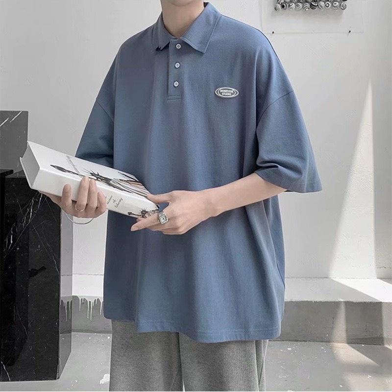 Áo polo unisex có phối logo trước ngực, chất cotton mền và mát A3
