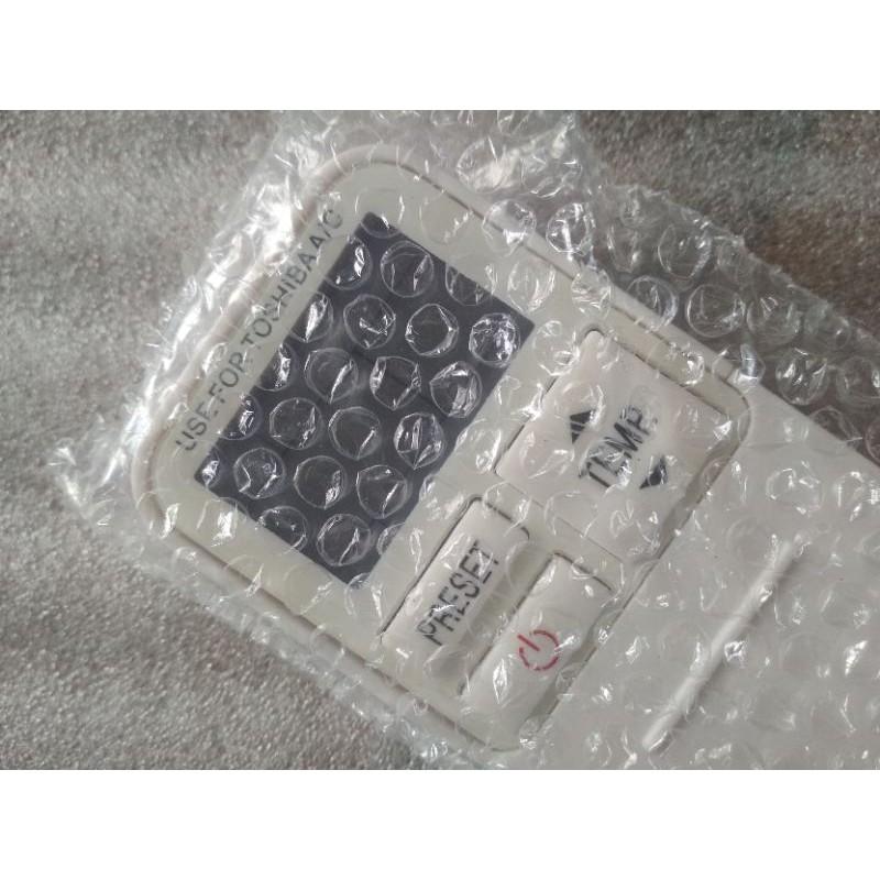 Remote dành cho máy lạnh toshiba trượt đời mới ( tặng kèm pin)