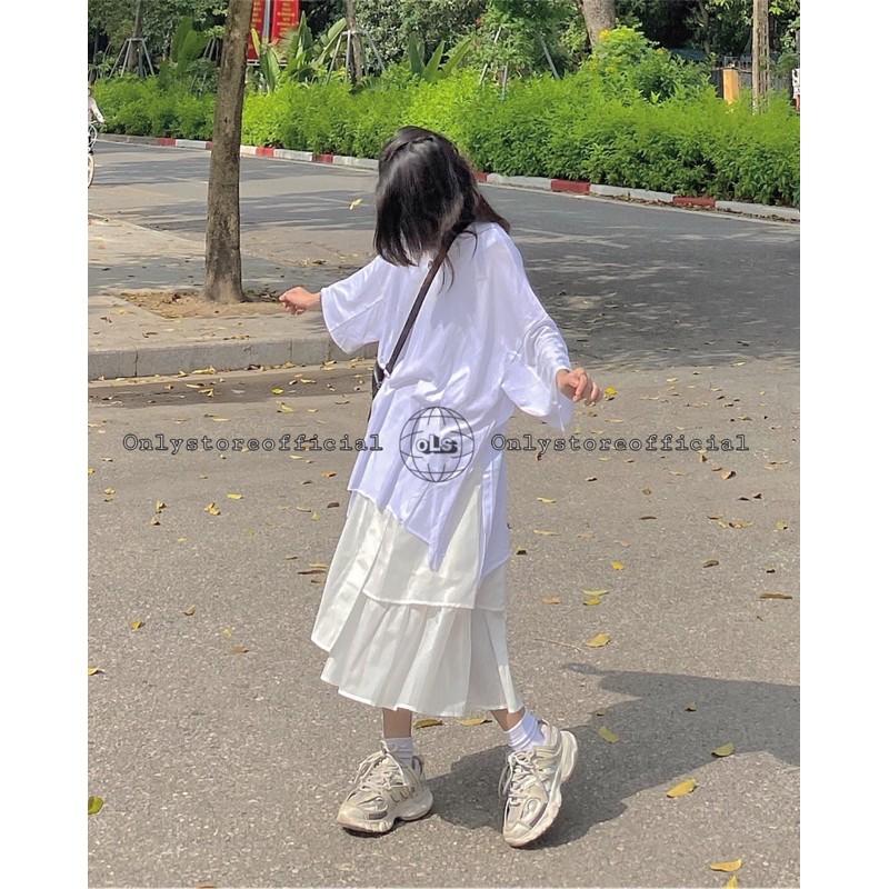 Áo xẻ tà oversize và chân váy tà lệch
