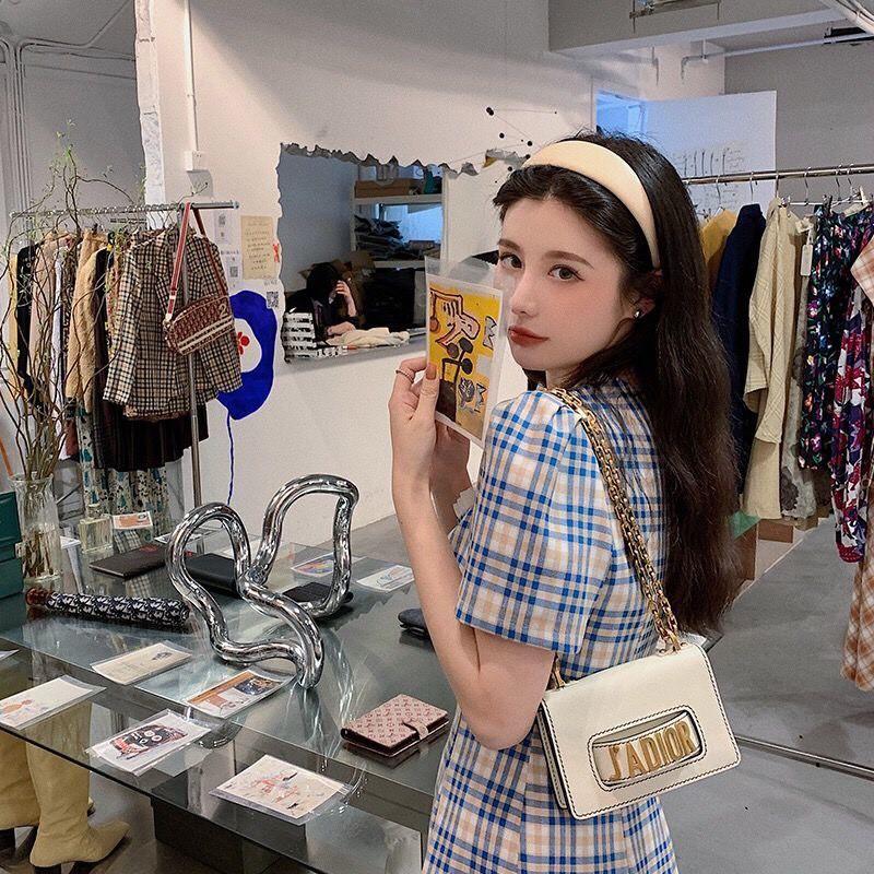 Váy caro nhún ngực