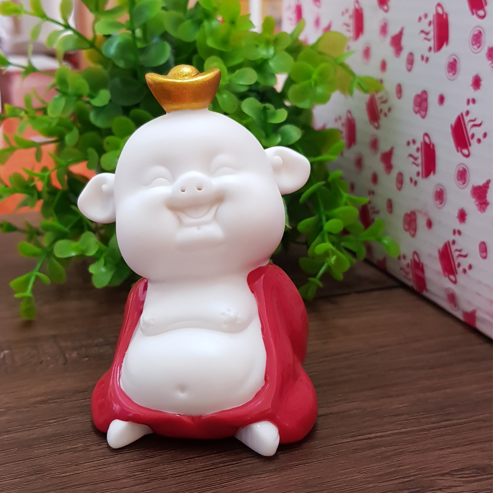 Tượng chibi chú Heo may mắn - chú heo có đỉnh vàng trên đầu