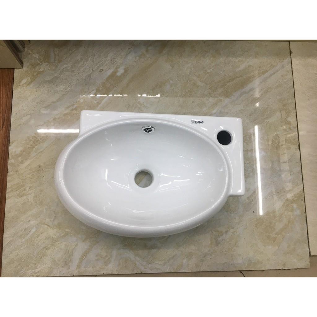 Chậu lavabo góc treo tường nhỏ hình bầu dục hàng loại 1