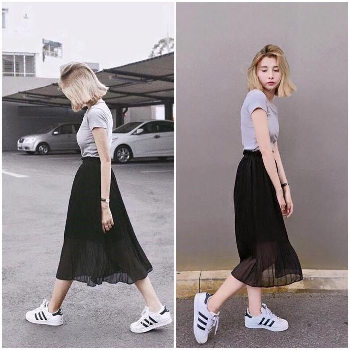 Chân váy xếp ly đen dài midi