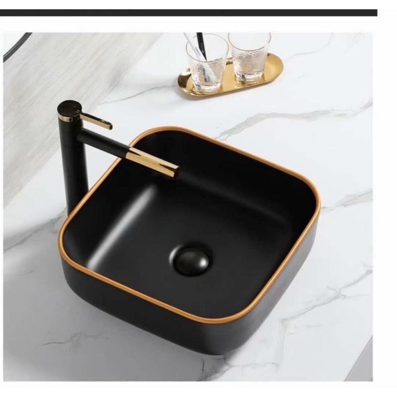 Chậu lavabo đen .Chậu rửa mặt đen viền vàng