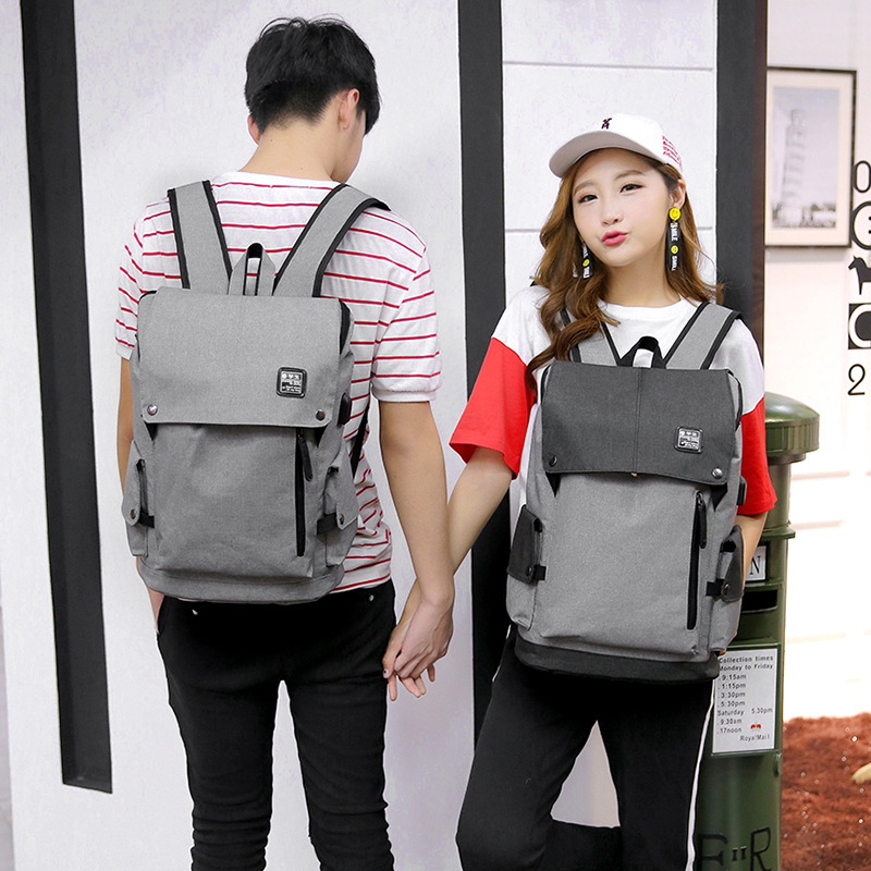 Ba lô du lịch Ba lô nam giới phiên bản Tiếng Hàn của sinh viên trường đại học Túi máy tính sạc lại