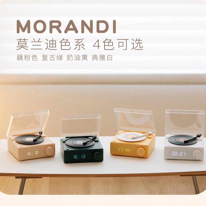 Quảng cáo sáng tạo nguyên tử máy ghi đĩa nhựa âm thanh thẻ cắm âm thanh không dây bluetooth thông minh để bàn đa chức năng loa đồng hồ đồng hồ báo thức