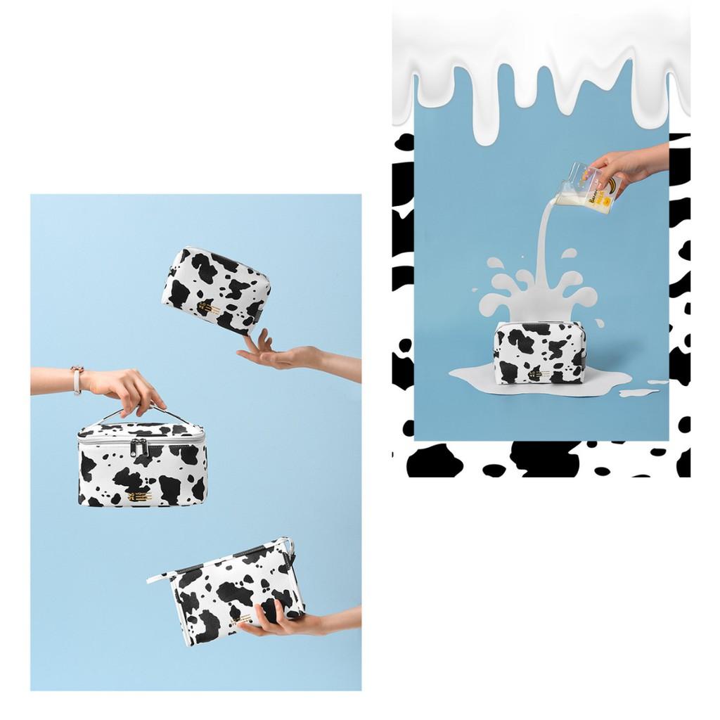 Túi đựng mỹ phẩm chất liệu Da PU Chống thấm nước Họa tiết Bò Sữa hiện đại TMP19