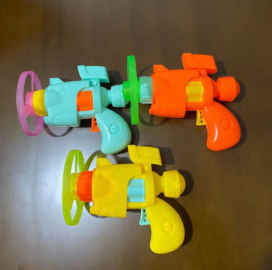 Đồ Chơi Trẻ Em Bắn Vòng Cho Bé 12cm Kèm 4 Vòng Quay
