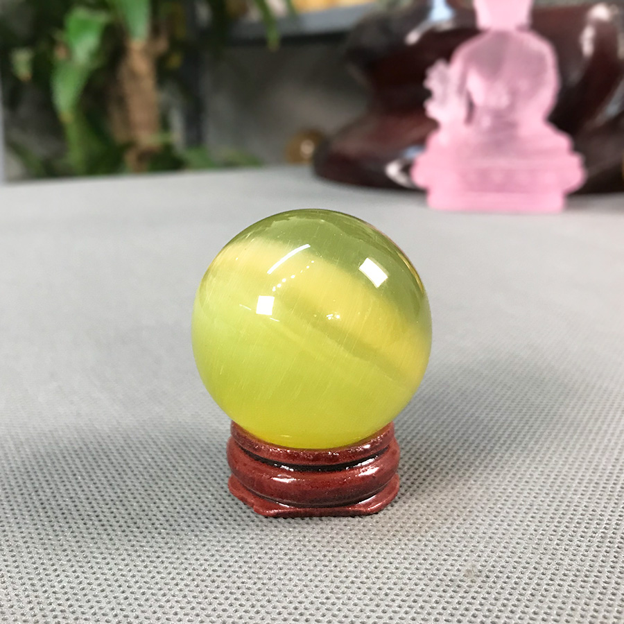 Quả Cầu Phong Thủy Pha Lê Mắt Mèo Vàng